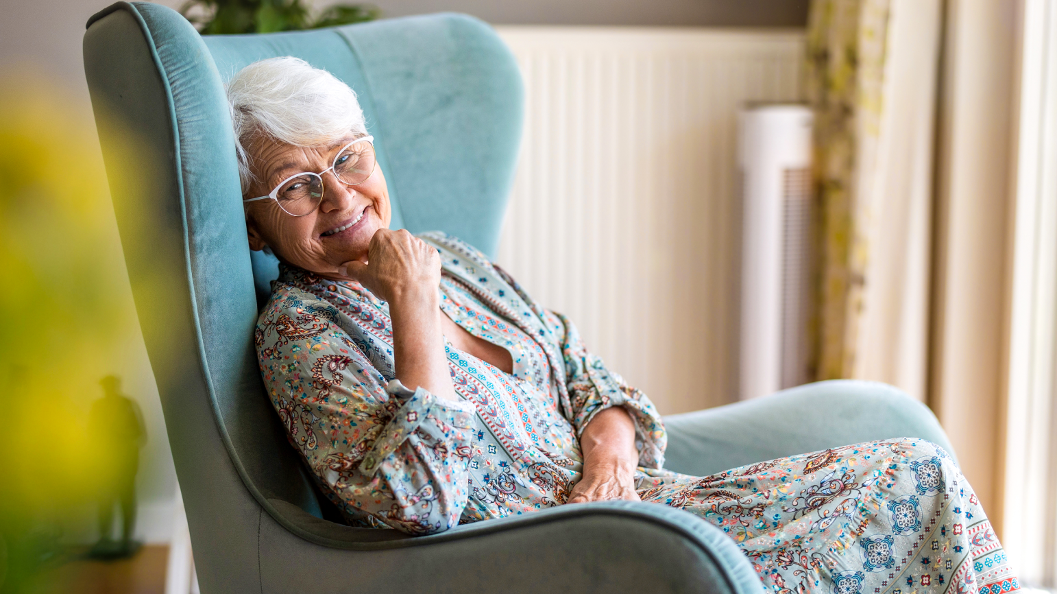 woman reclining in a cozy chair